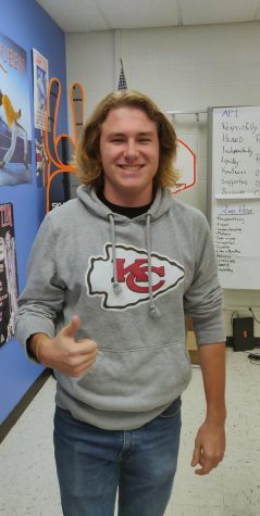 Senior Will Eckert wearing a Chiefs hoodie to celebrate their narrow victory against the Broncos.