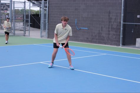 Junior Jaxson Holman at a tennis practice in the late spring.