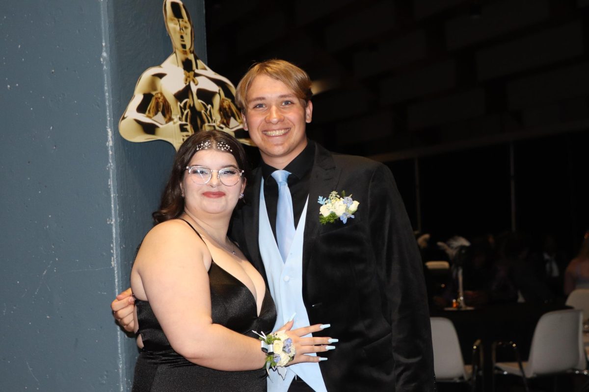 Seniors at prom. Senior Mila Hawkins and Senior Lanny Breedlove pose for a picture.
Mila and Lanny are wearing Matching corsages. “It was really fun. We went to every dance together and this was a great one to end off with,” Senior Mila Hawkins said.
