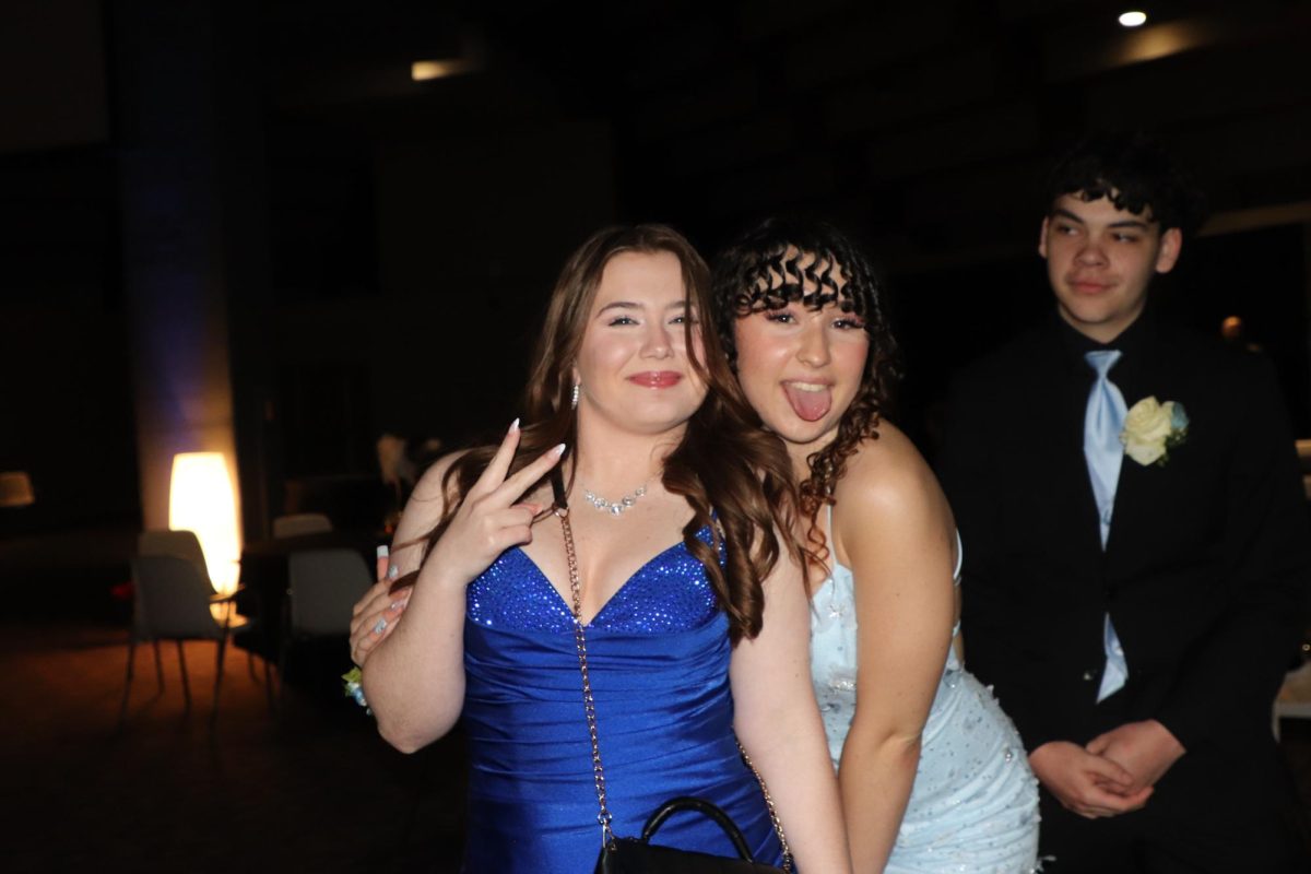Nothing but smiles and blue. Best friends Allie Kepner, a Sophomore, and Senior Mya Mellody pose for the camera. “Me and Mya have been friends for a year now, I feel like both of us are each other's other half. At the end of the day it will always be me and her,” Kepner said.