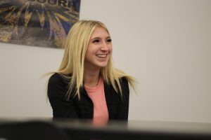 Sophomore Emalee Bake laughs in class. 